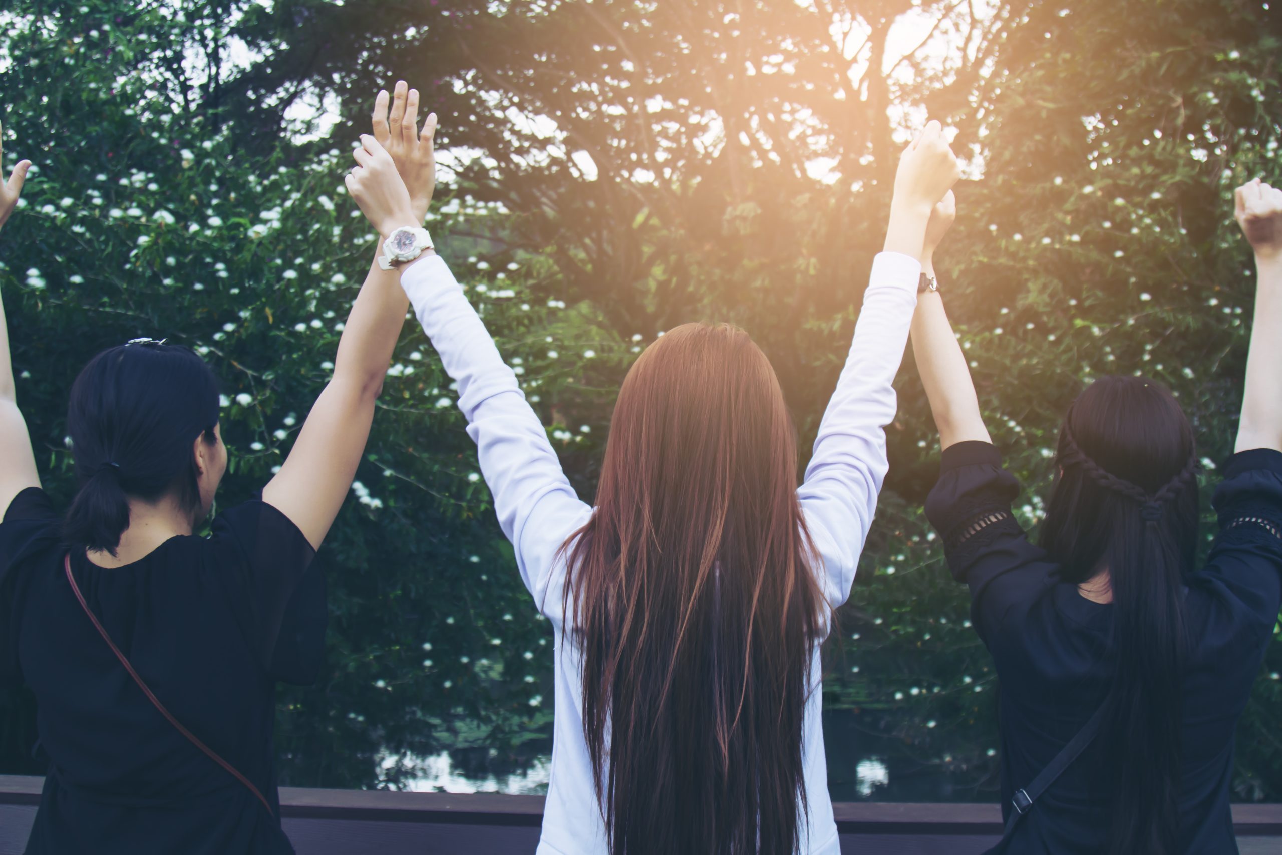 teenage girls glad hands.